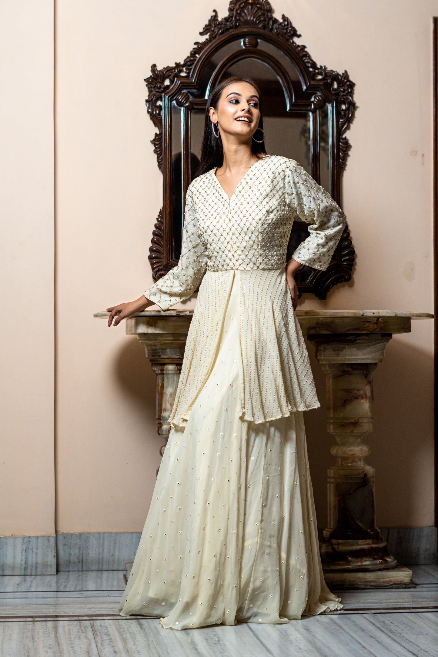 IVORY PEPLIM BLOUSE WITH TEXTURE LEHENGA