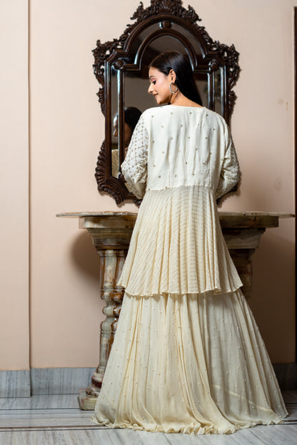 IVORY PEPLIM BLOUSE WITH TEXTURE LEHENGA